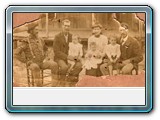 I believe this is Henry Carter and Sarah Loundia (Reeves) Reynolds - center, possibly James R. Reynolds on left - not sure of the rest?